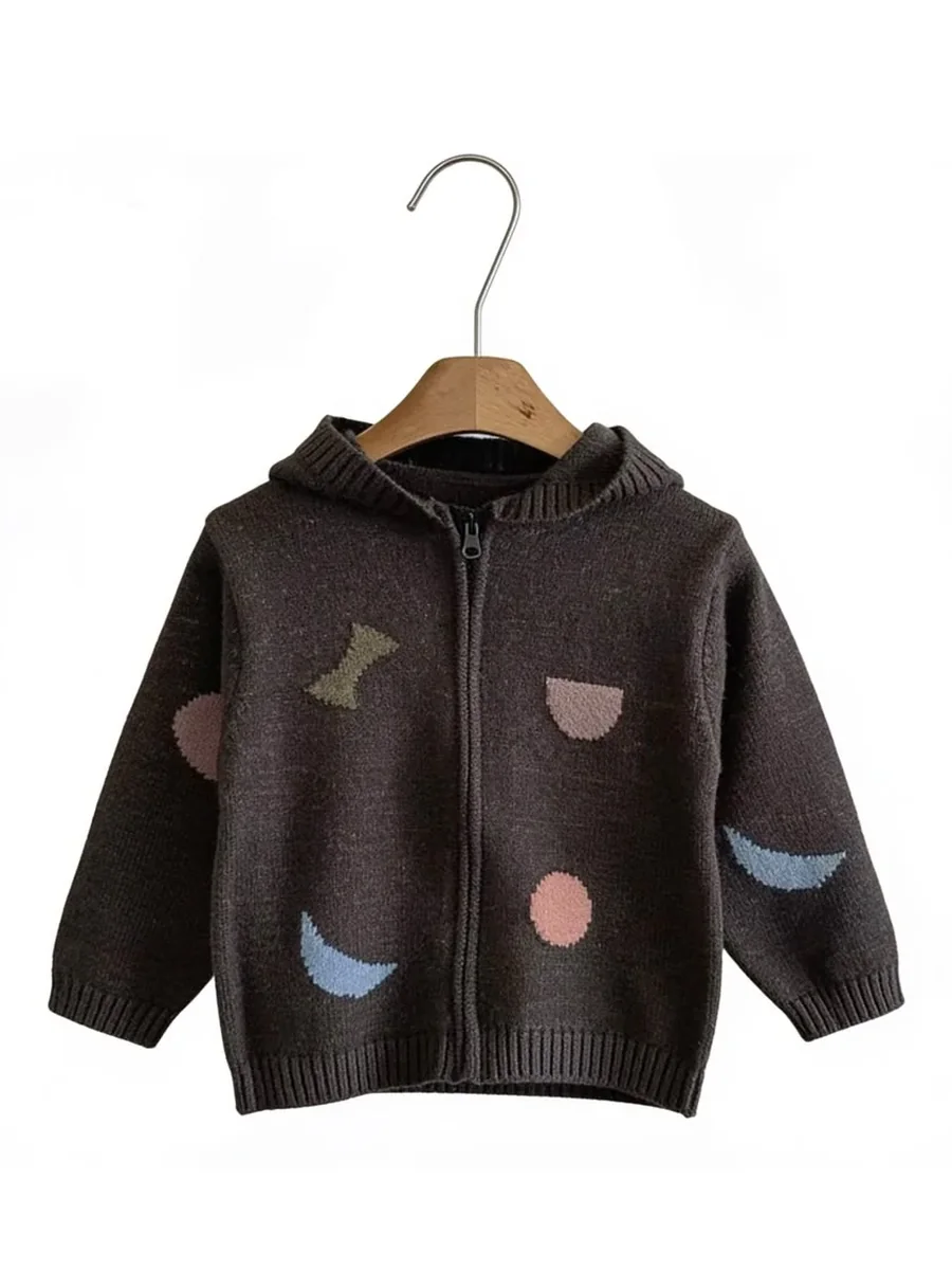 Kinkuu knit zip hoodie in dark brown with pink, blue and olive shapes, on a hanger