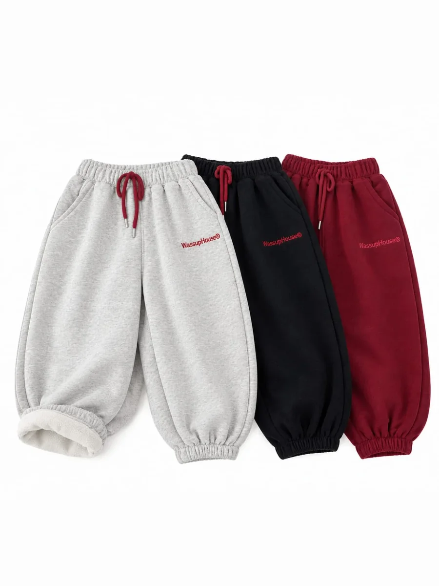 Kinkuu fleece-lined balloon joggers bundle: the balloon joggers in grey, black and burgundy laid side by side, one cuff turned to show the fleece