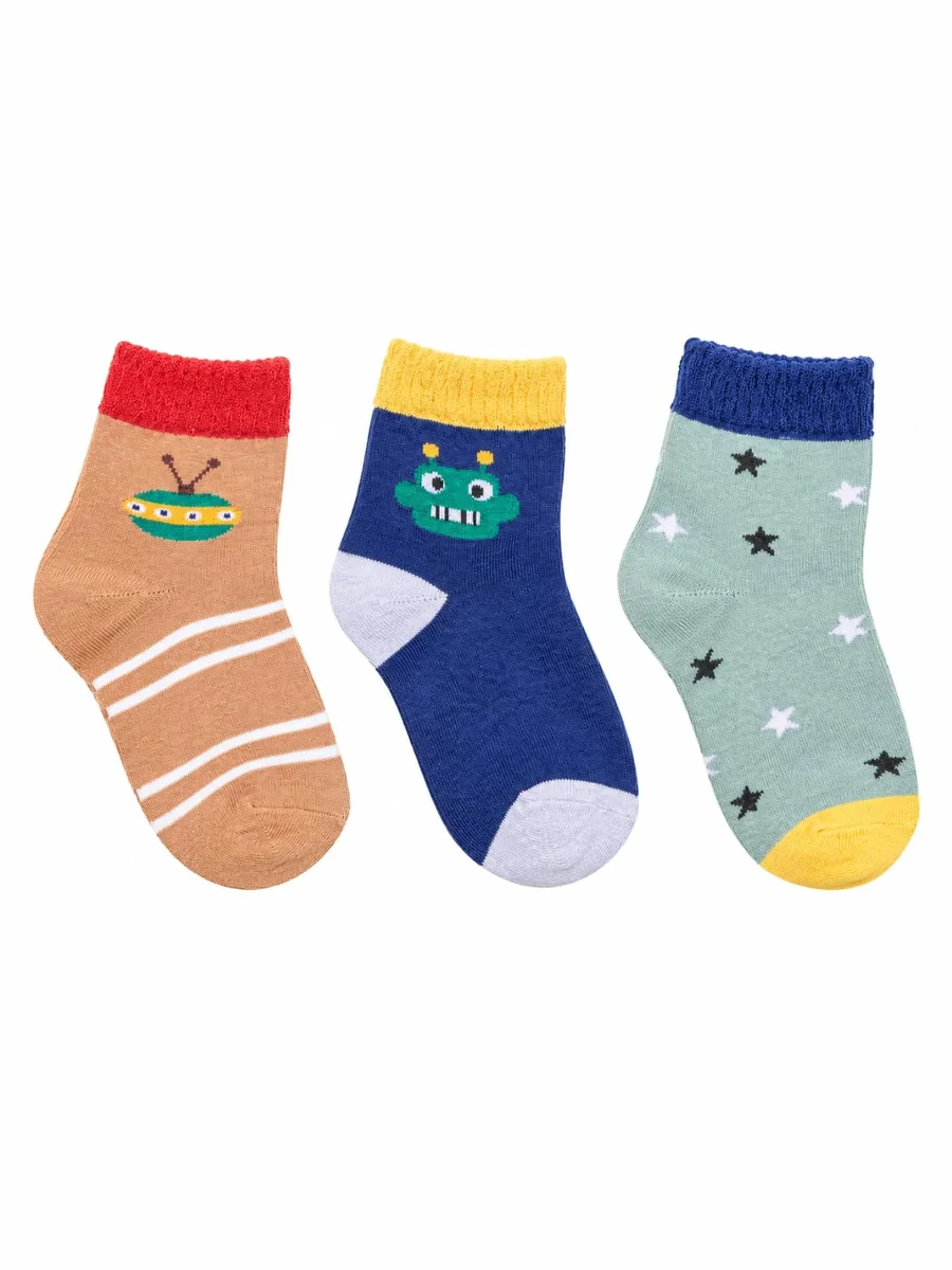 Kinkuu socks, a set of 3 pairs: a tan sock with a flying saucer, a navy sock with a green robot, and a sage sock with stars
